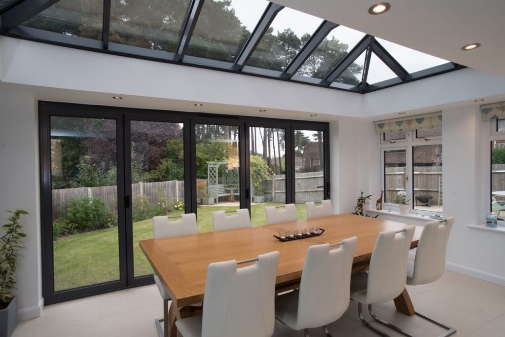 Atlas black orangery with bifold doors