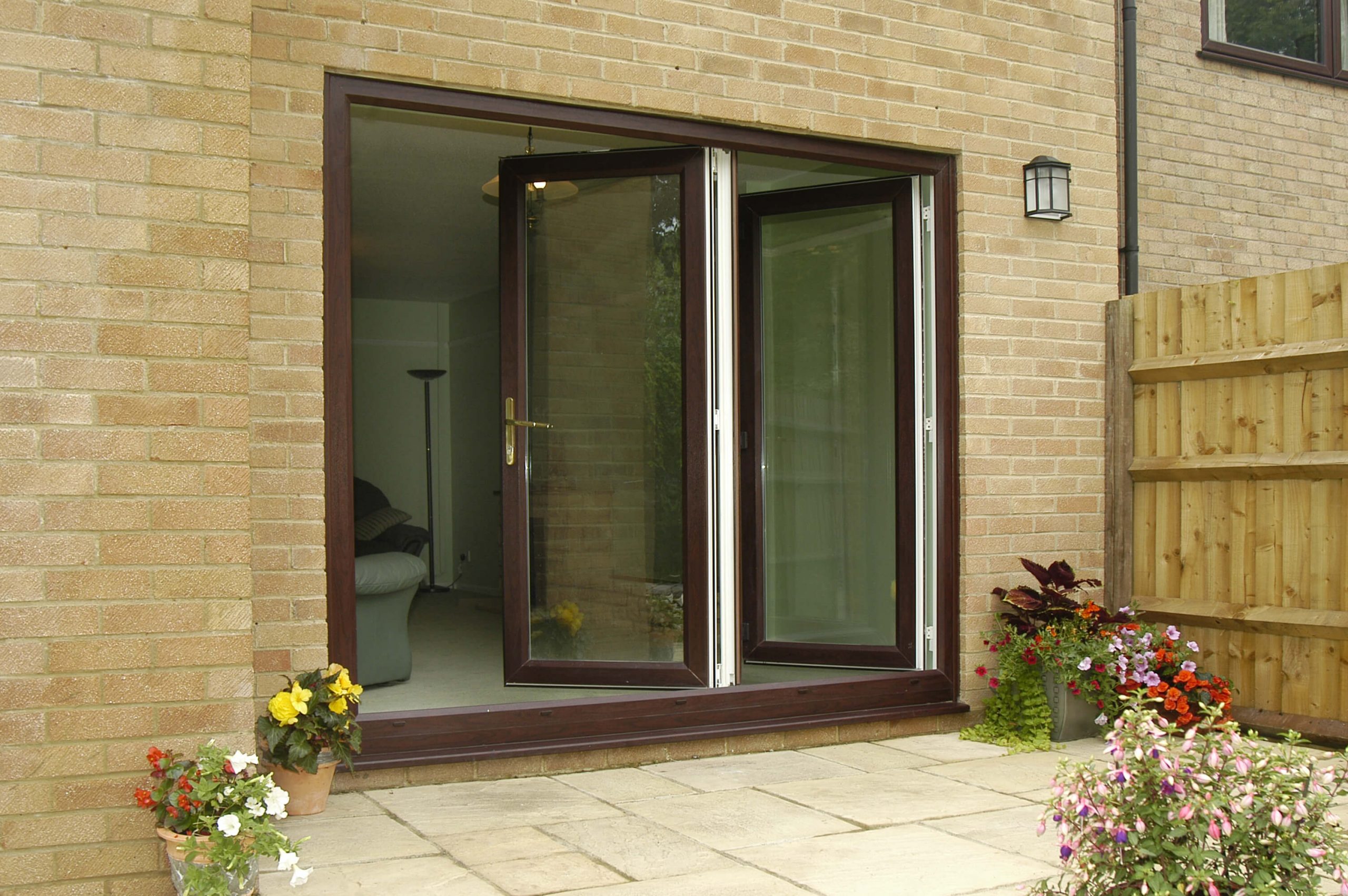 Brown uPVC bifold door in Surrey