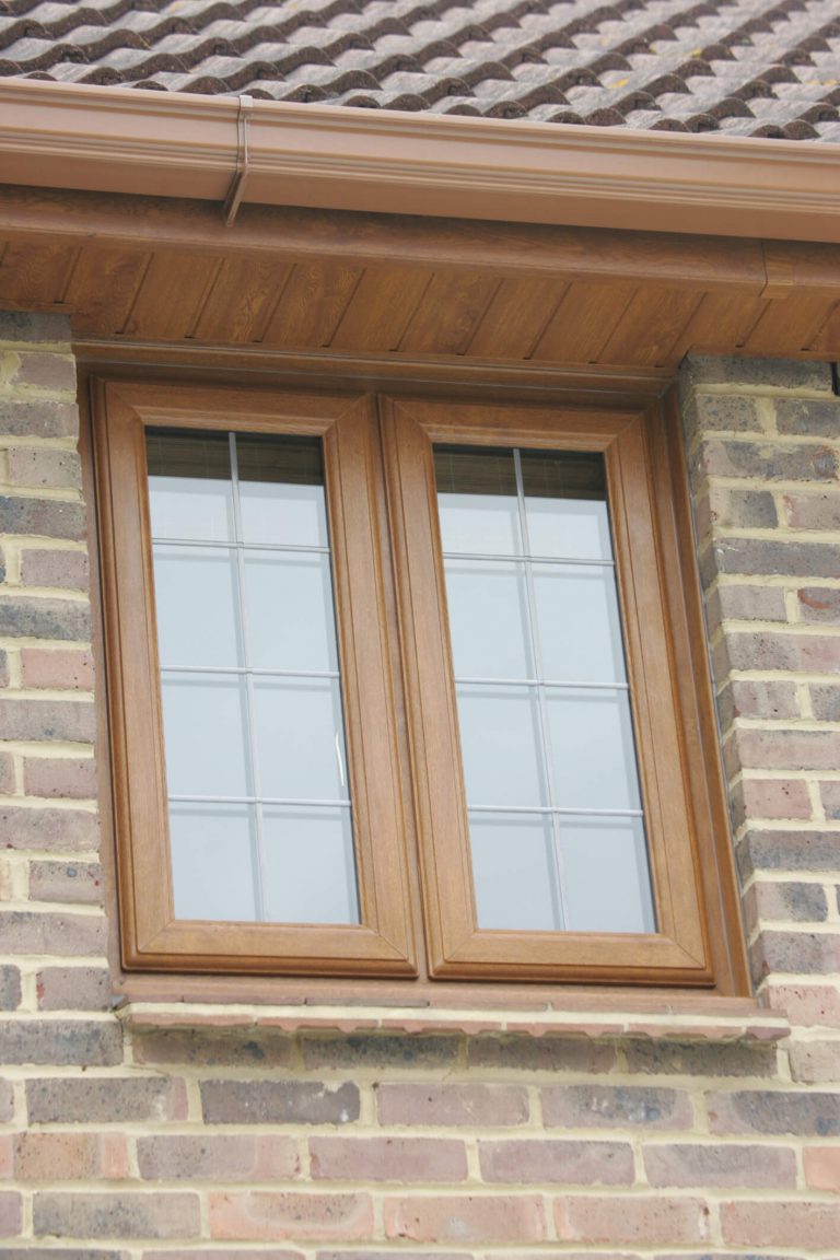 Golden oak uPVC casement window