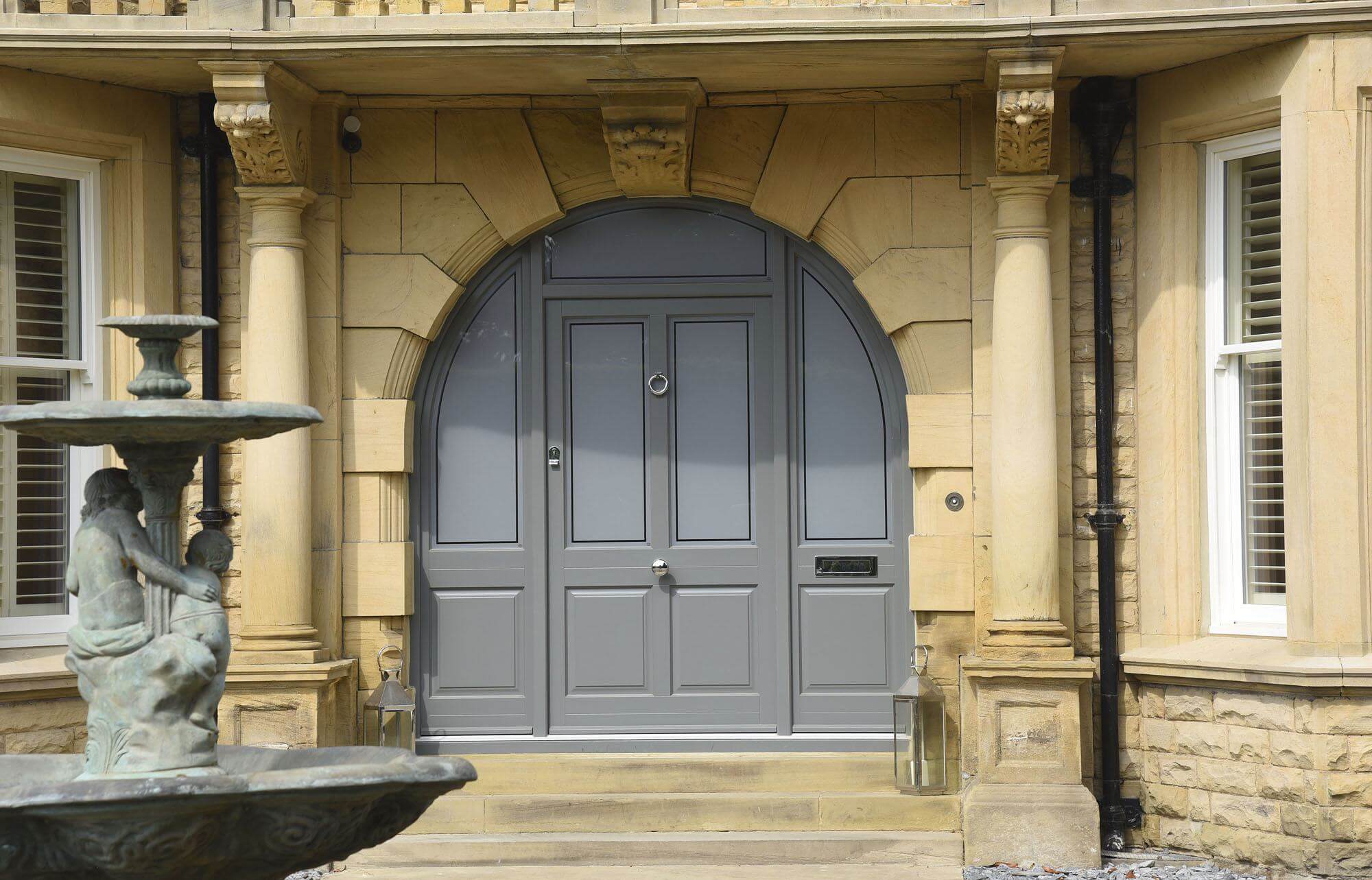 Large grey timber front door