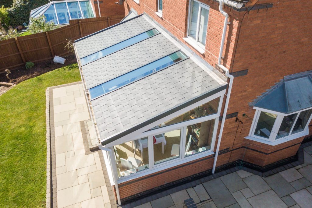 Long solid roof lean to conservatory