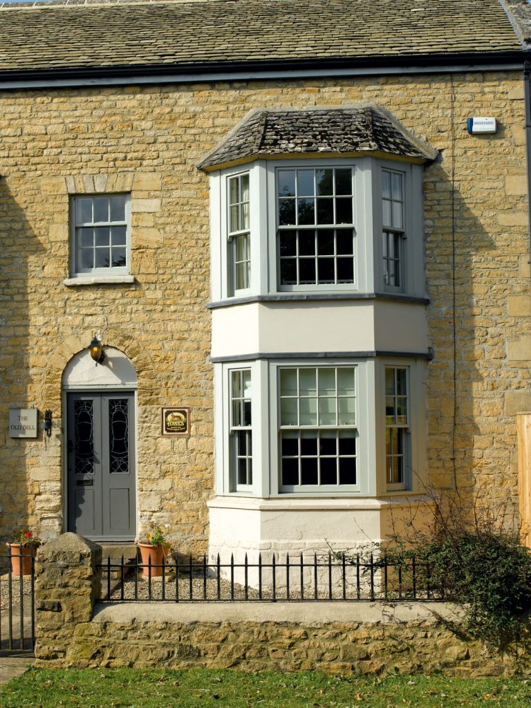 Grey timber bay windows