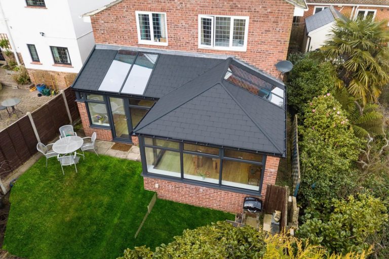 Ultraframe black tiled conservatory roof