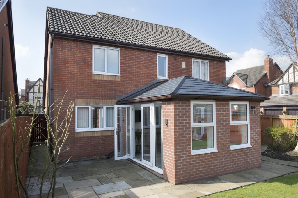 Black tiled roof extension