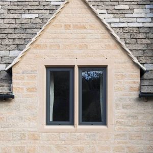 Black windows installed on a heritage home.