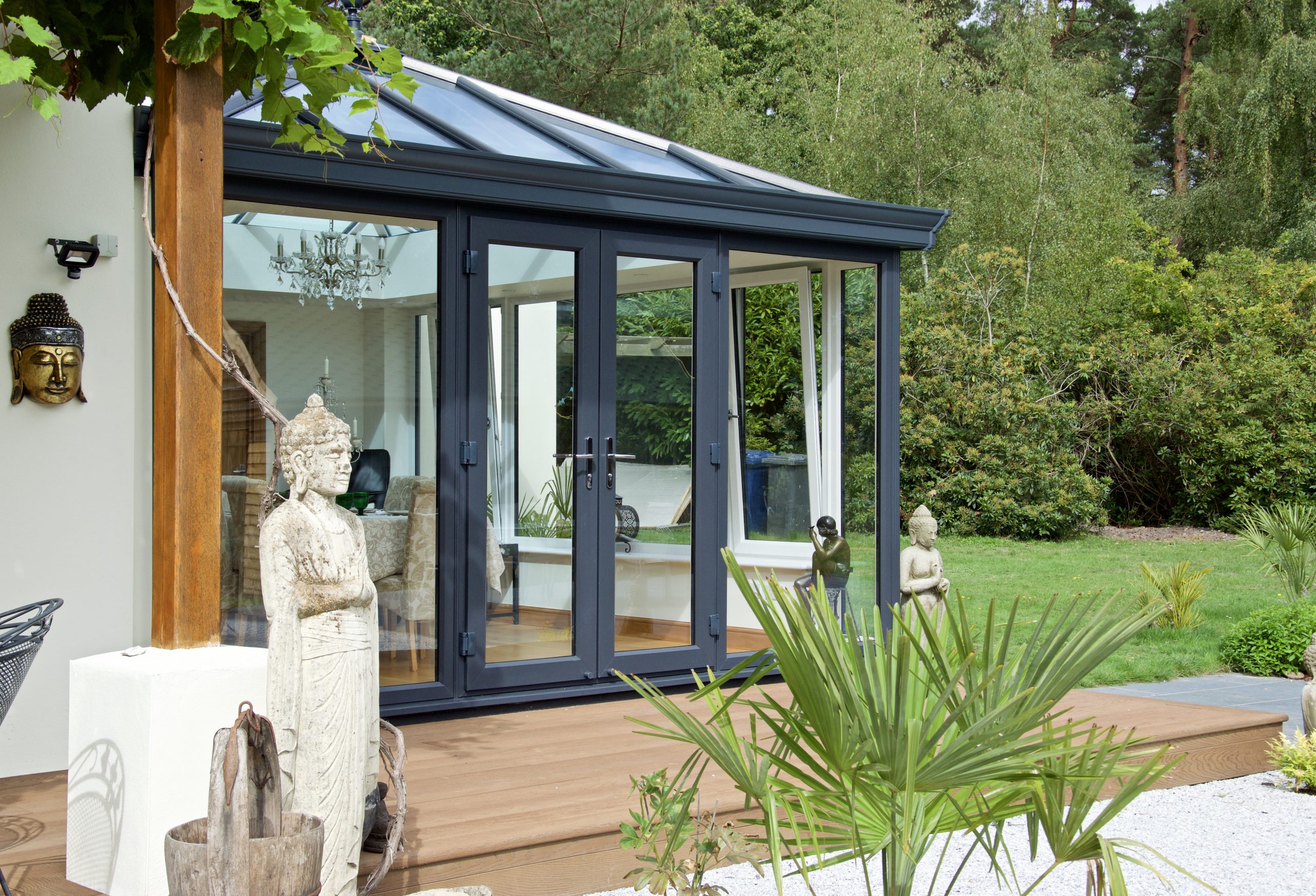 Black conservatory with decking.