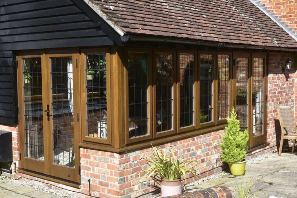 wooden effect windows with lead bars