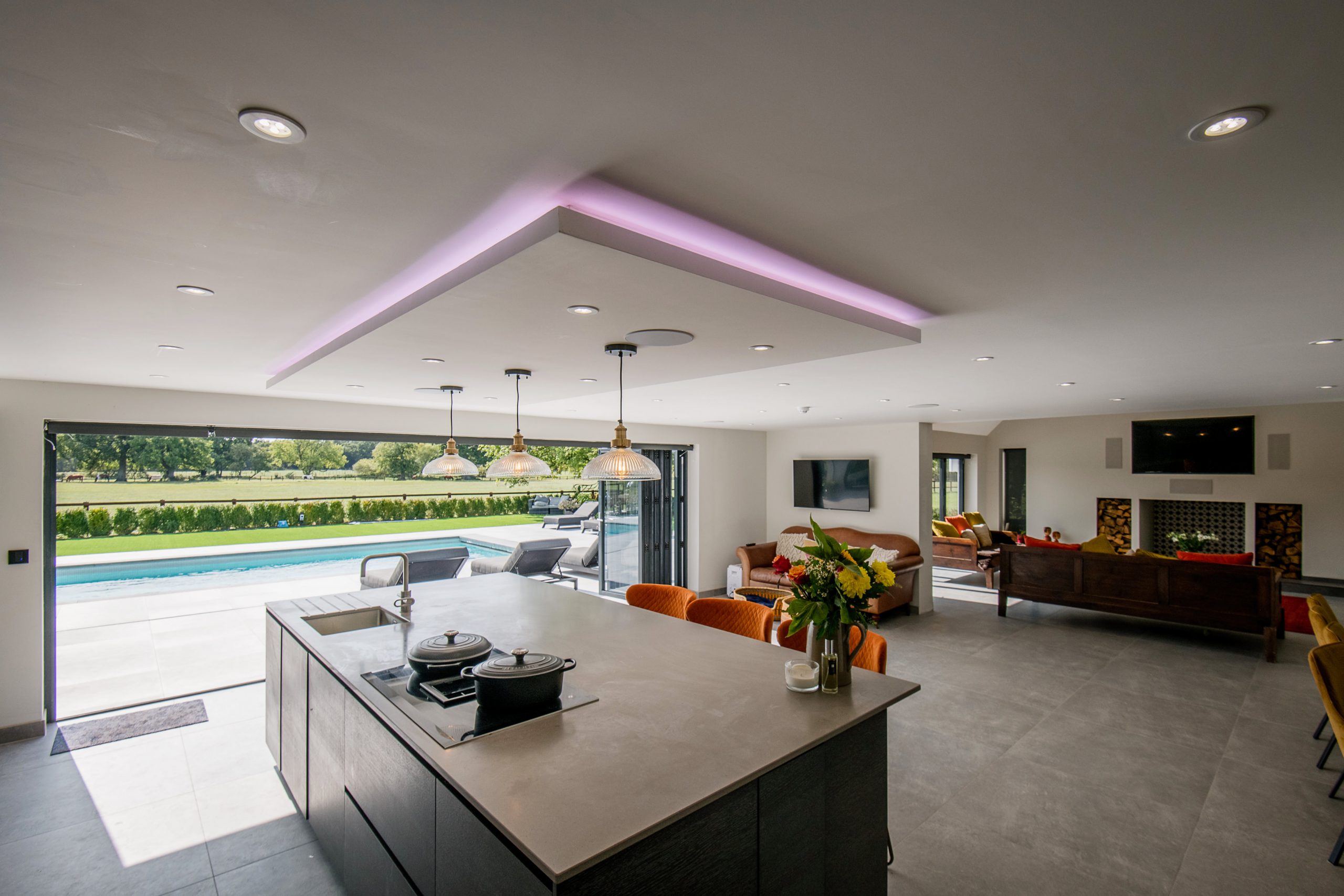 Inside a kitchen extension with bifold doors.