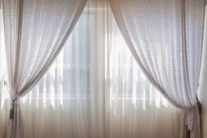 Blinds with open curtains.