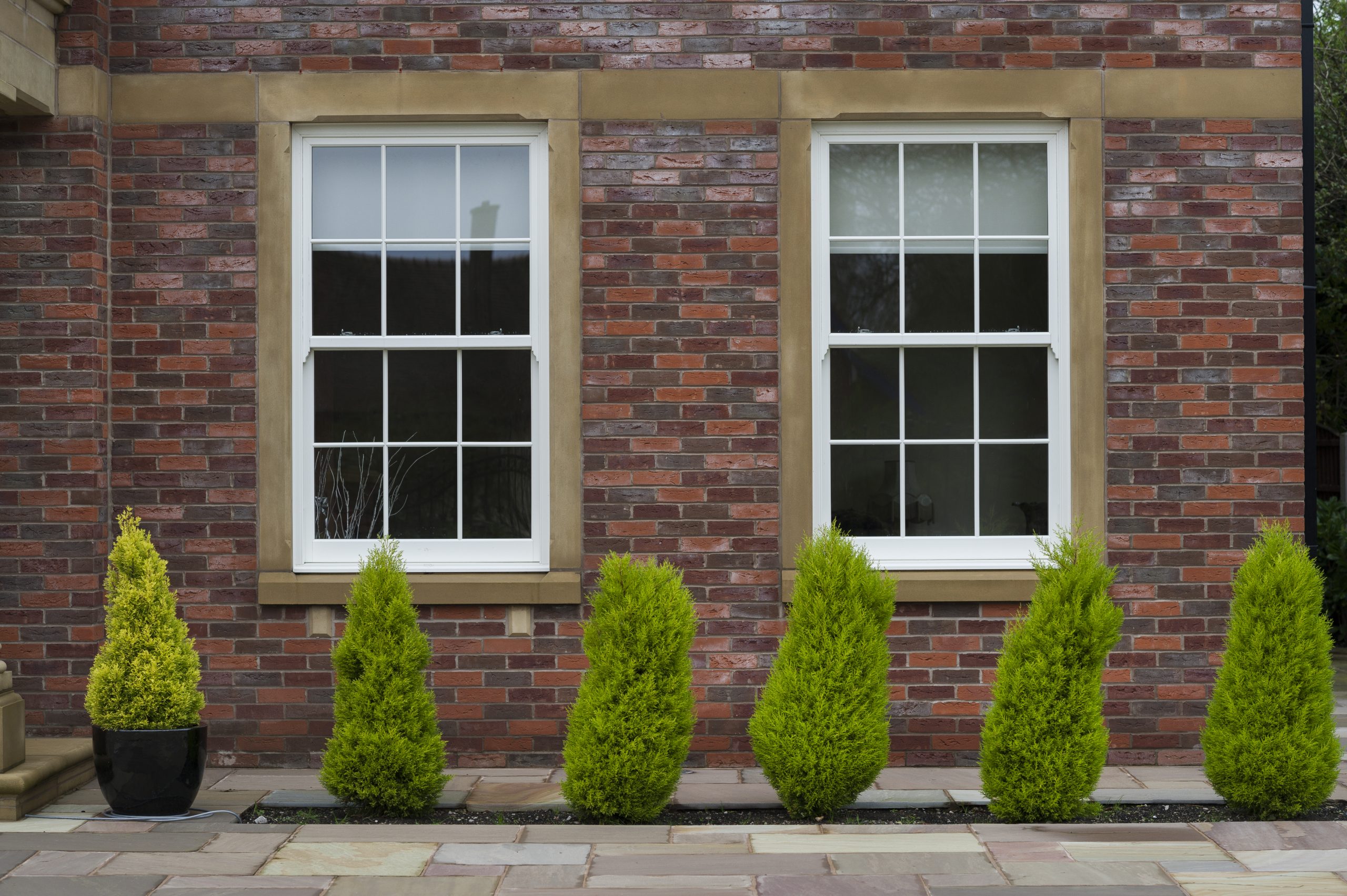 Two large heritage white sash windows.