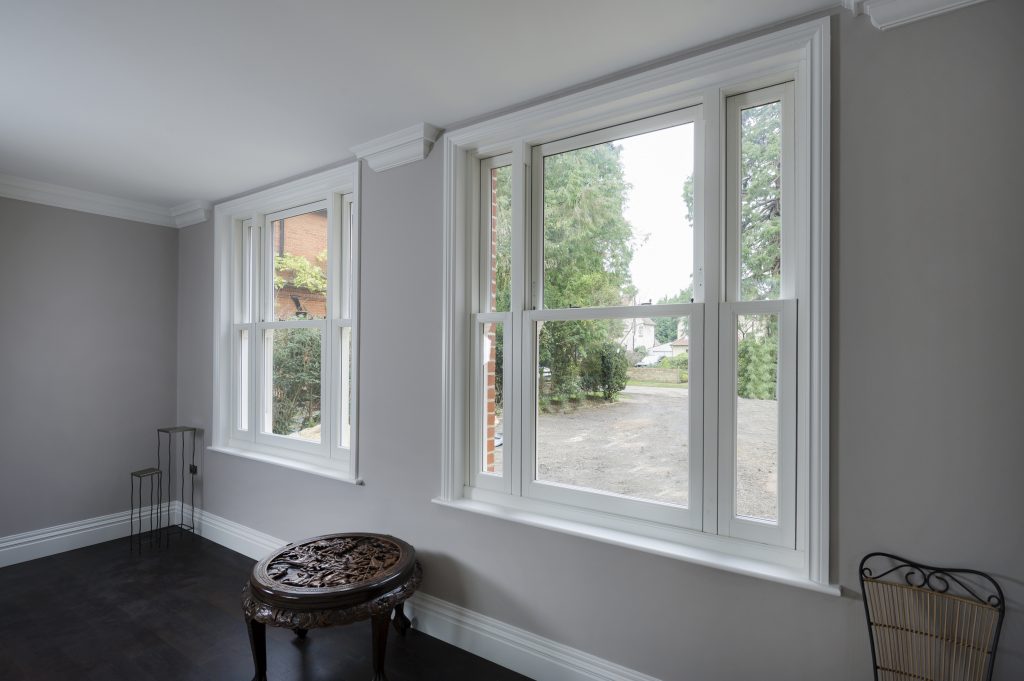 Inside a home with closed sash windows.