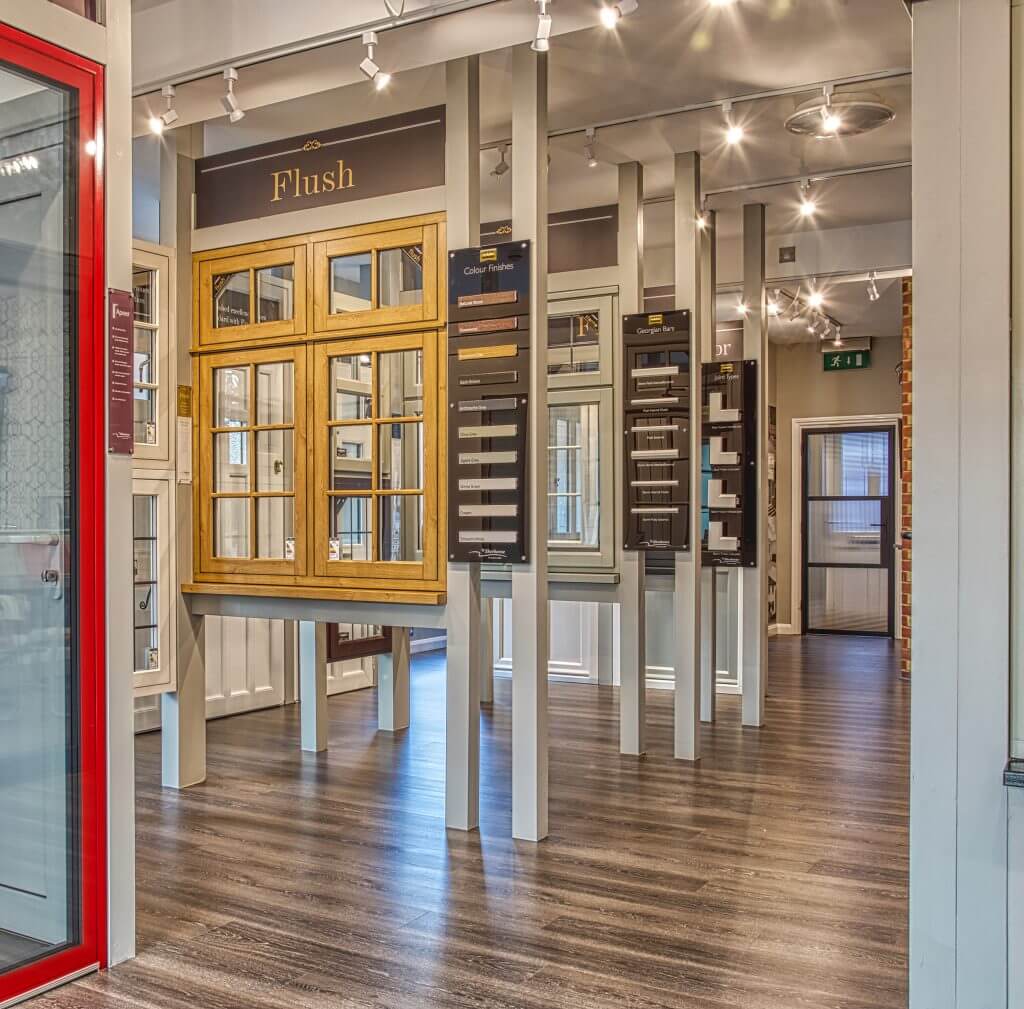 internal shot of showroom with display timber effect upvc windows